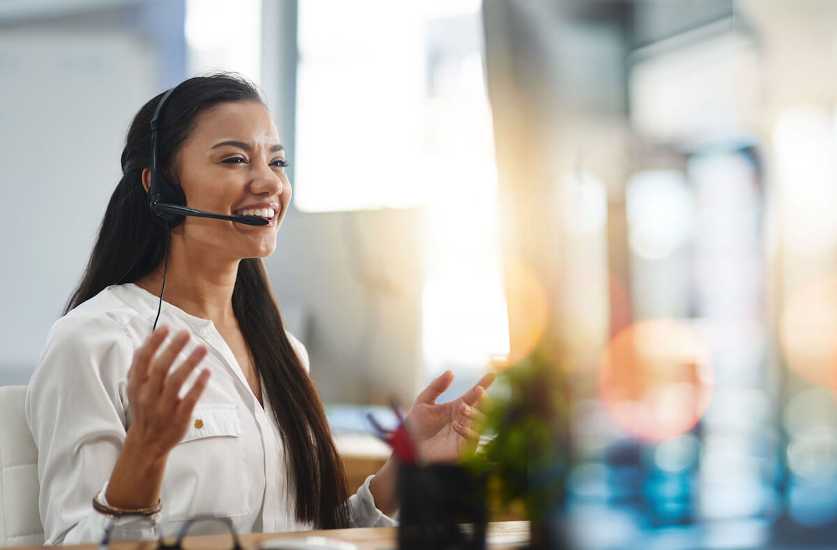 Woman with headset talking