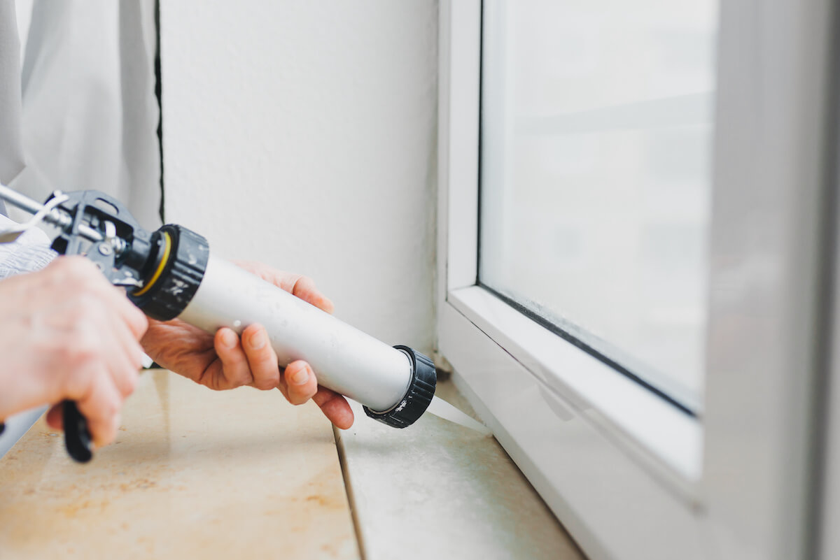 silicone being applied to window