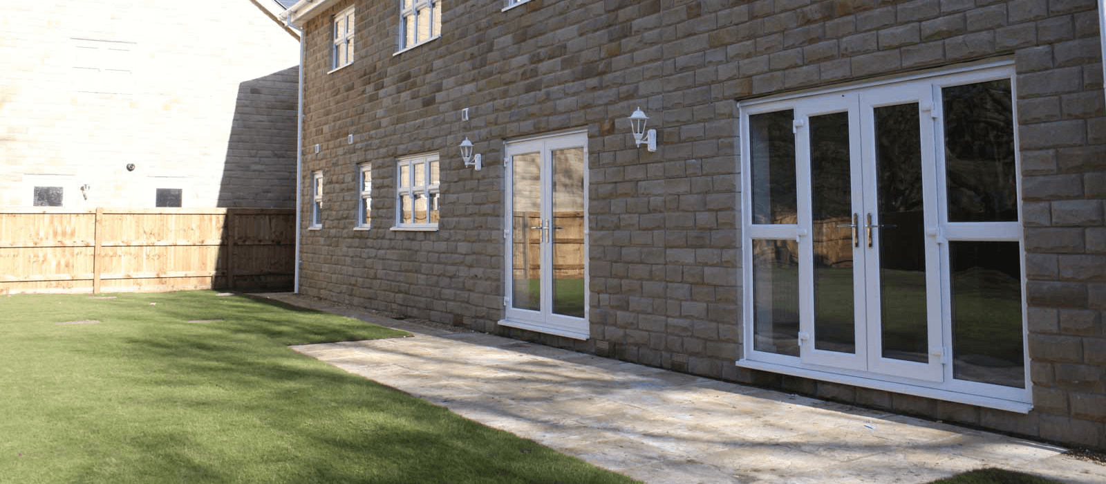 white upvc french doors leading to garden